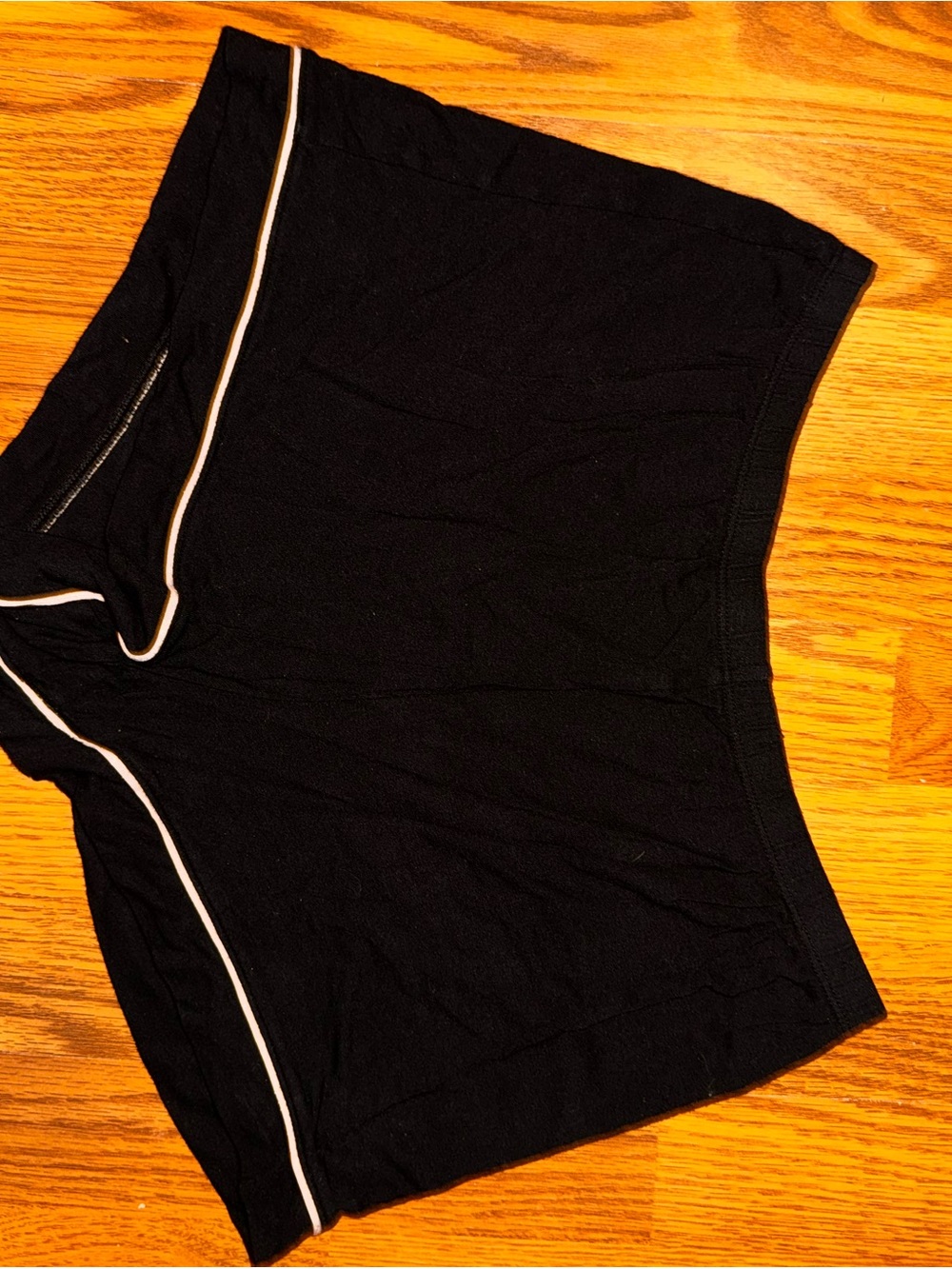 stars above Black Shorts with white lines